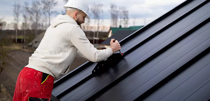 Tin Roof Ridge Cap Installation in Windermere